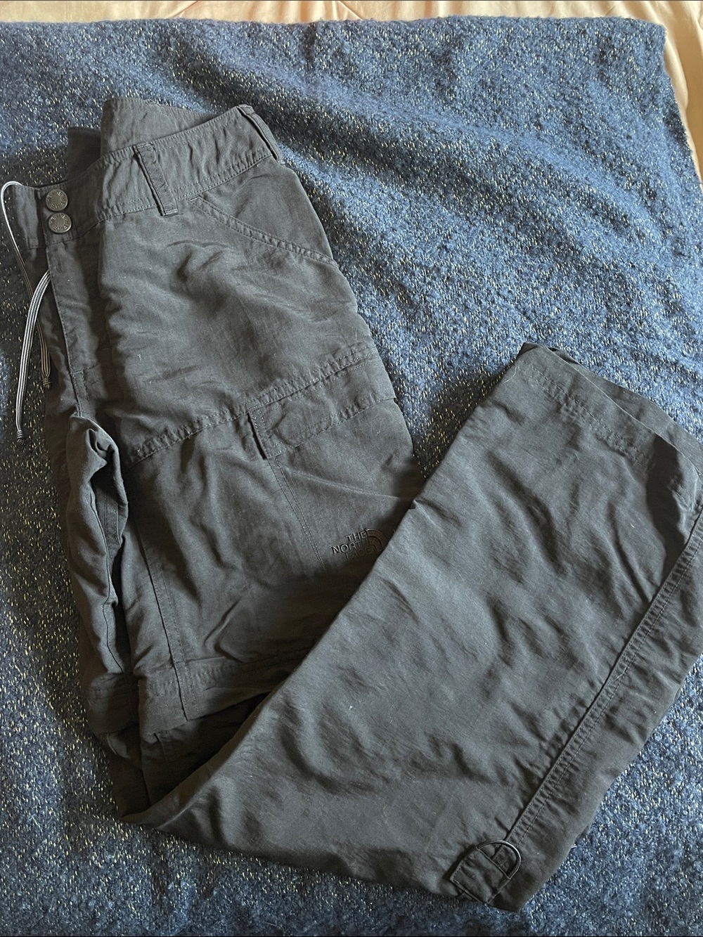 The North Face woman’s black Cargo Pants with zip off legs